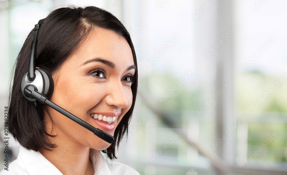 Woman Call Center operator on office background Woman Call Center operator on office background