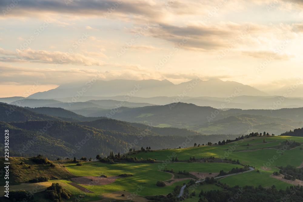 Obraz premium Beautiful sunset over high rocky peaks in High Tatras mountains on Slovak and Polish border.