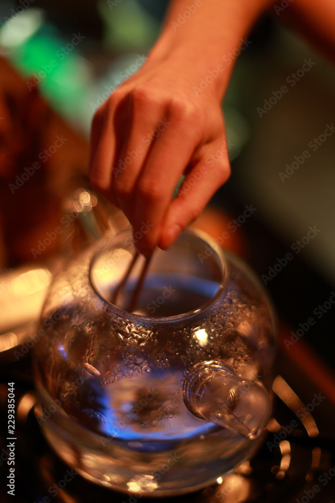 Boiling of chinese tea in the glass teapot
