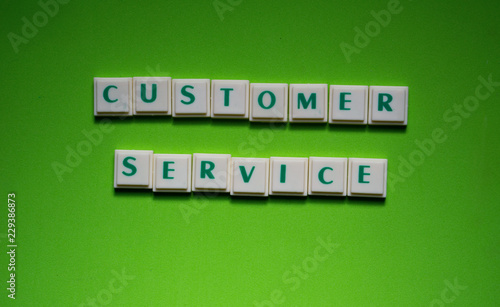 Created words of "customer service" with the letters on the green screen background