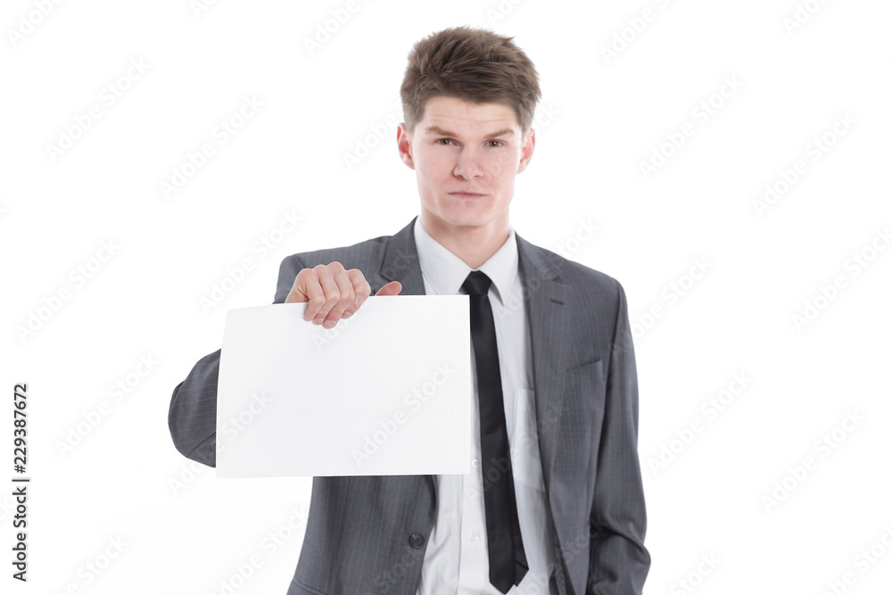 young businessman showing a blank sheet.isolated on a white young businessman showing a blank sheet.isolated on a white