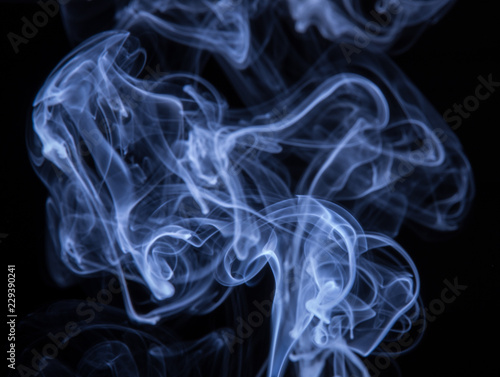 Abstract colorful smoke isolated on black background, fire design