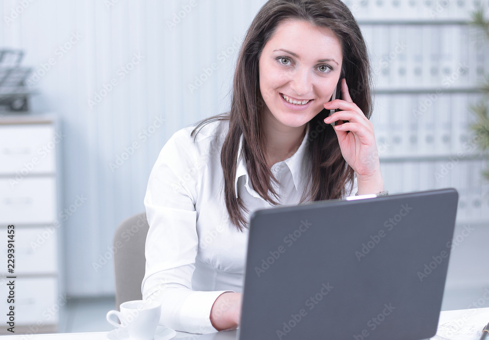 closeup. business woman talking on mobile phone closeup. business woman talking on mobile phone