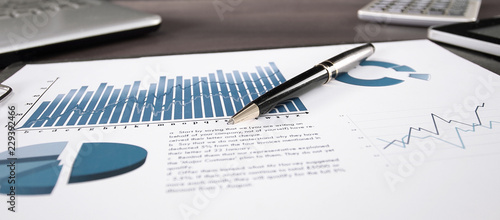 business background. financial report on the table at the businessman