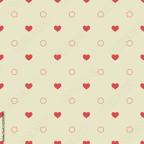 Red hearts and circles on a light yellow background. Seamless pattern. Gentle colors.