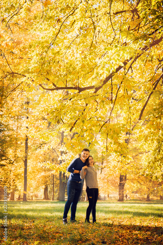 couple rejoices in autumn fall