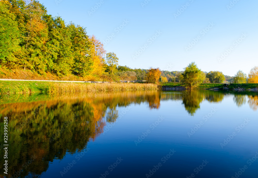 Autumn landscape with a lake view on an autumn afternoon Autumn landscape with a lake view on an autumn afternoon