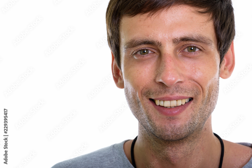 Close up of happy young handsome man smiling Close up of happy young handsome man smiling