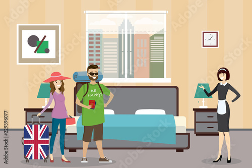 Tourists with luggage and maid in the hotel room
