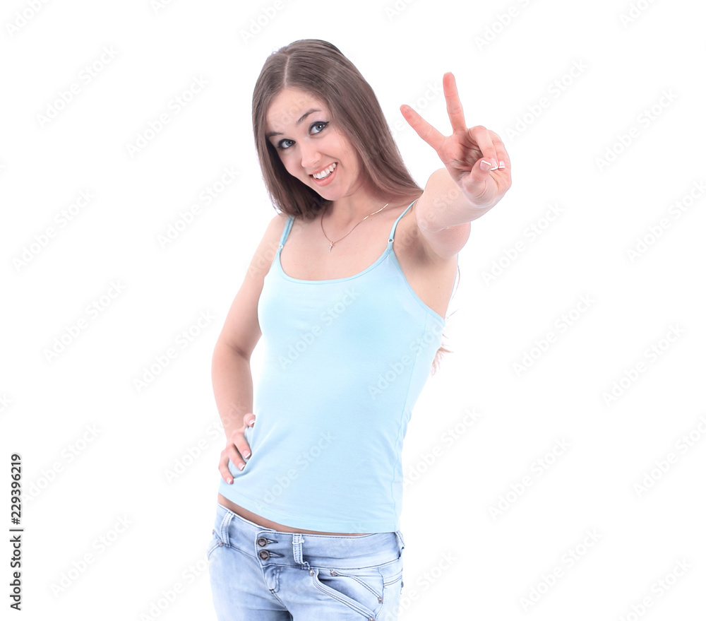 modern young woman showing victory sign. isolated on a white background. modern young woman showing victory sign. isolated on a white background.