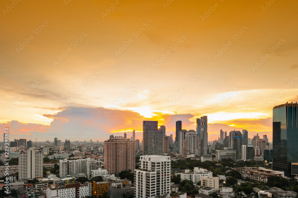 cityscape Bangkok sunset skyline, Thailand. Bangkok is metropolis and favorite of tourists live at between modern building / skyscraper, Community residents