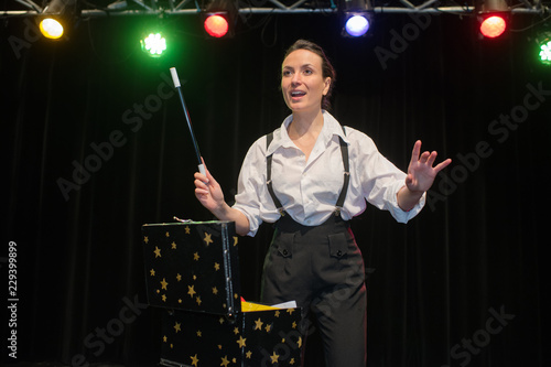 Obraz na plátně female magician performing her show on stage