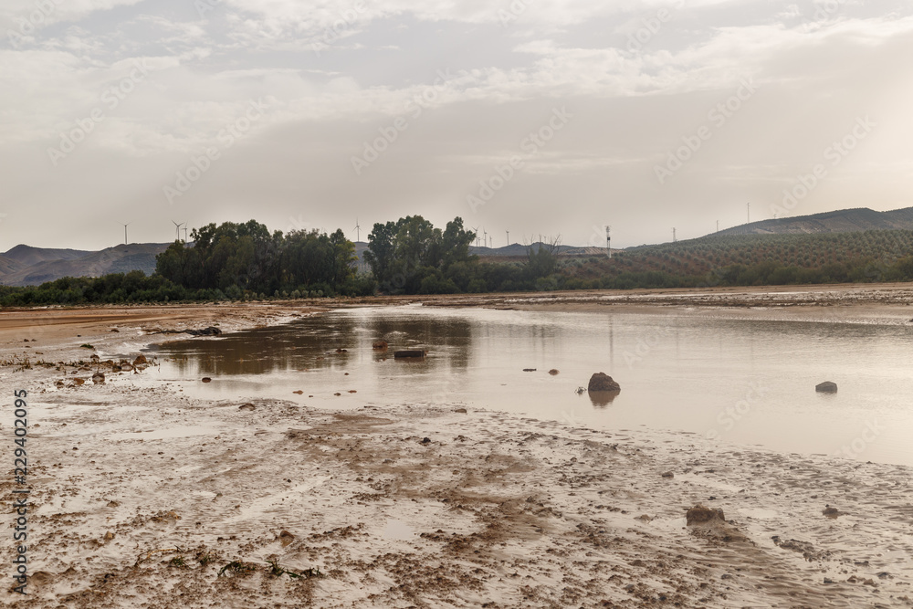 Devastated croplands after the overflow of a river caused by historic storms in Seville and Málaga