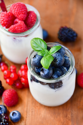 Healthy yougurt with mix berry, selective focus, the concept of a healthy Breakfast, diet food