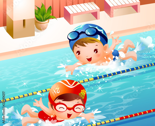 High angle view of a boy and a girl swimming in a swimming pool