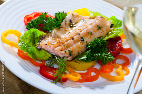 Canvas Print Roasted trout fillet with vegetables