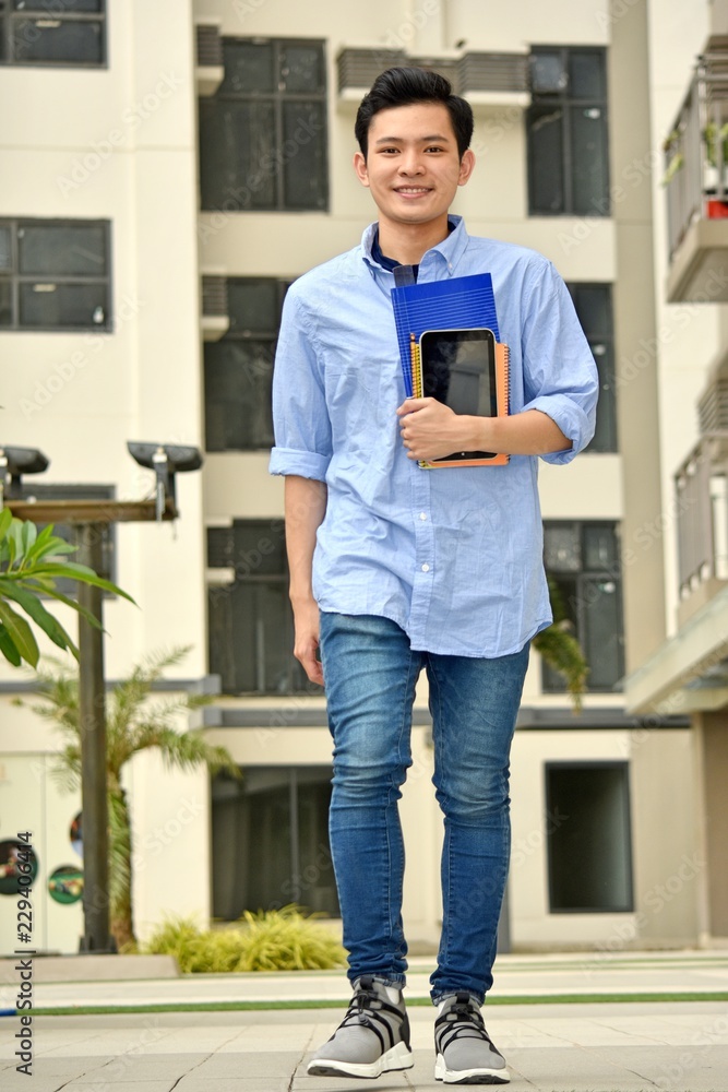 Fototapeta premium Filipino Boy Student Smiling Walking