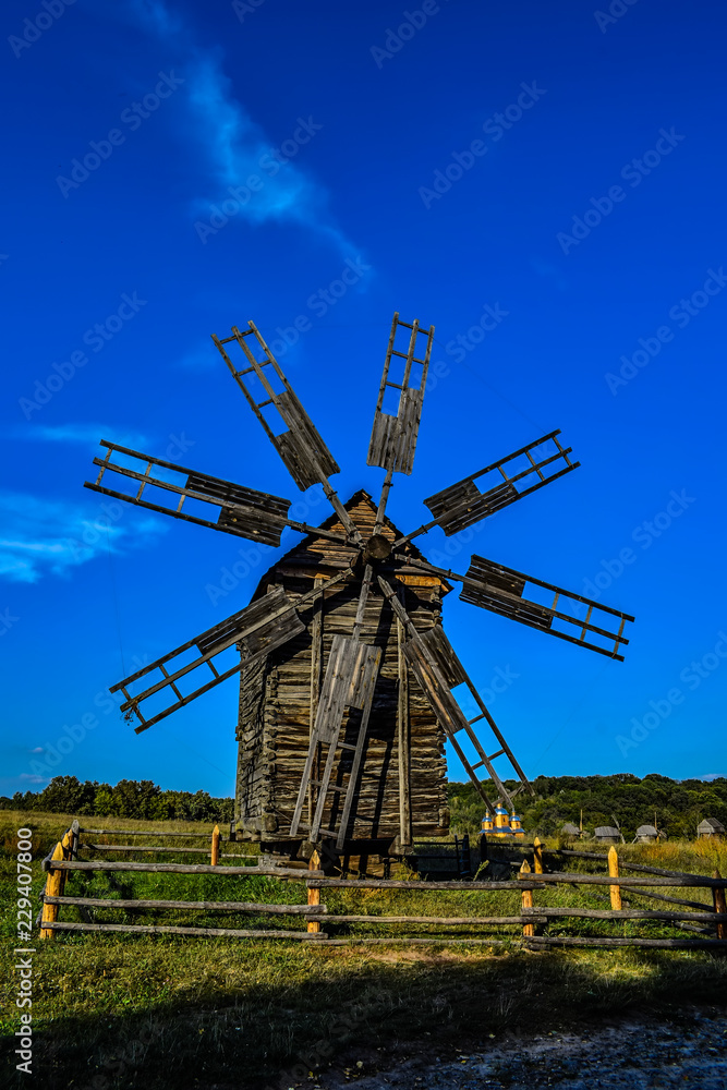 windmill in field windmill in field