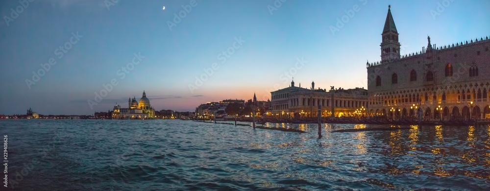 Naklejka premium Italy beauty, bell tower of San Marco square and cathedral Santa Maria della Salute in Venice, Venezia
