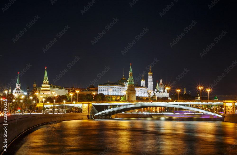 sight of Moscow Kremlin and Bolshoy Kamenny Bridge on Moskva River at night