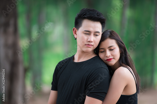 Picture of asian couple in love have fun,Happy people concept,Thailand people,Love is everything,Hug from back