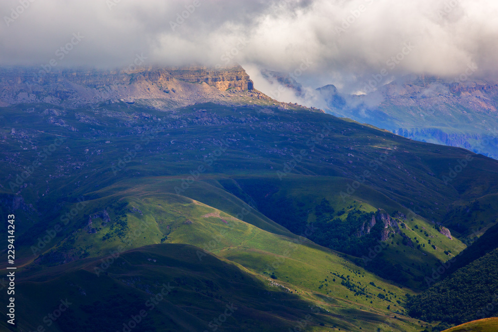 View of the mountain plateau in the clouds in the summer in the North Caucasus in Russia.