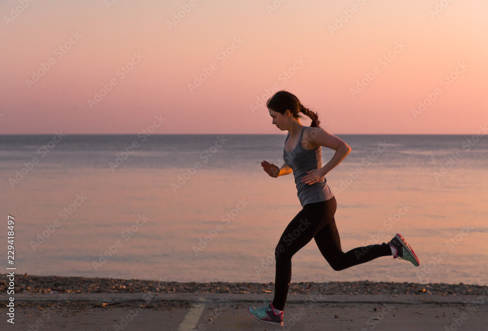 Women jogging at the sea background