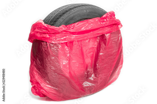 Wallpaper Mural Summer car tires in red plastic bags Torontodigital.ca