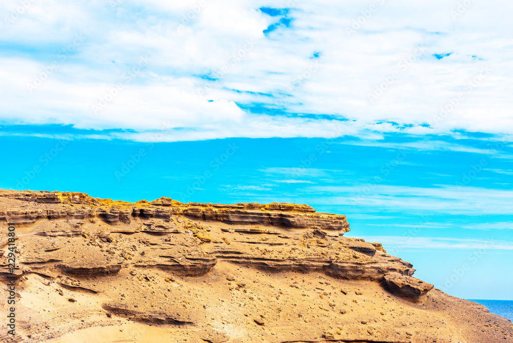 View of the rocks on the beach Papakolea (green sand beach), Hawaii, USA.