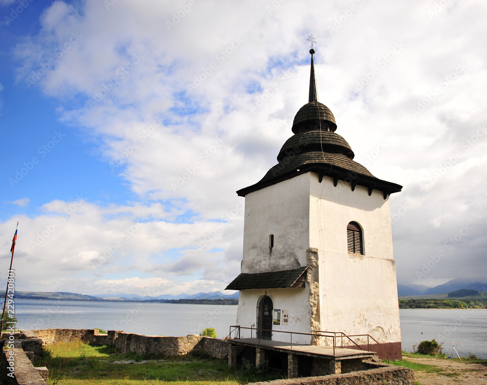 Lonely tower by the lake of Liptovska mara