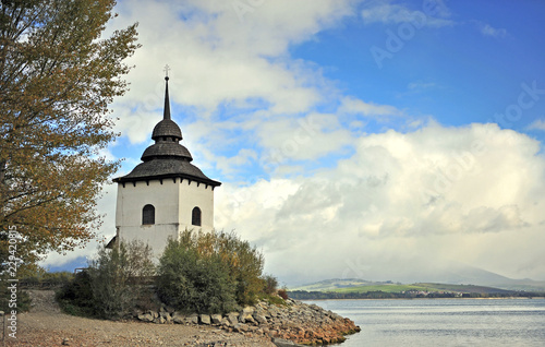 Beautiful white chapel by the Lispovska lake