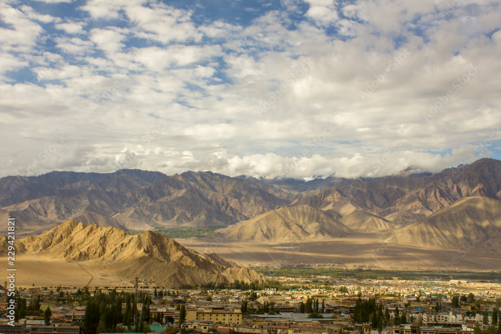 city in the mountainous Himalayan valley in the afternoon city in the mountainous Himalayan valley in the afternoon