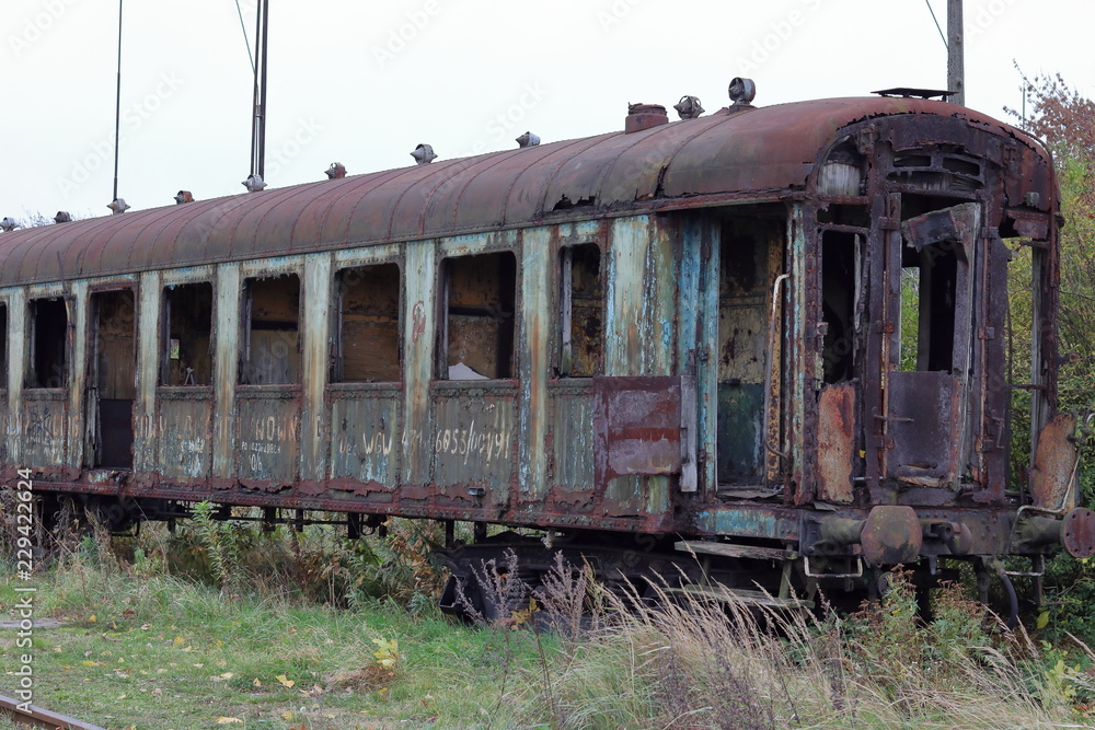 Fototapeta premium Old train wagon, abandoned, rusty, Krakow, Plaszow