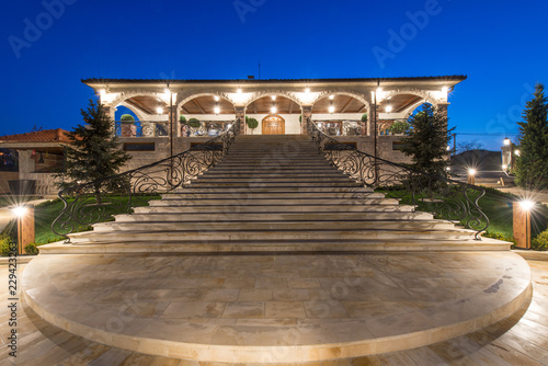 Night lightening of luxury mansion exterior © poplasen