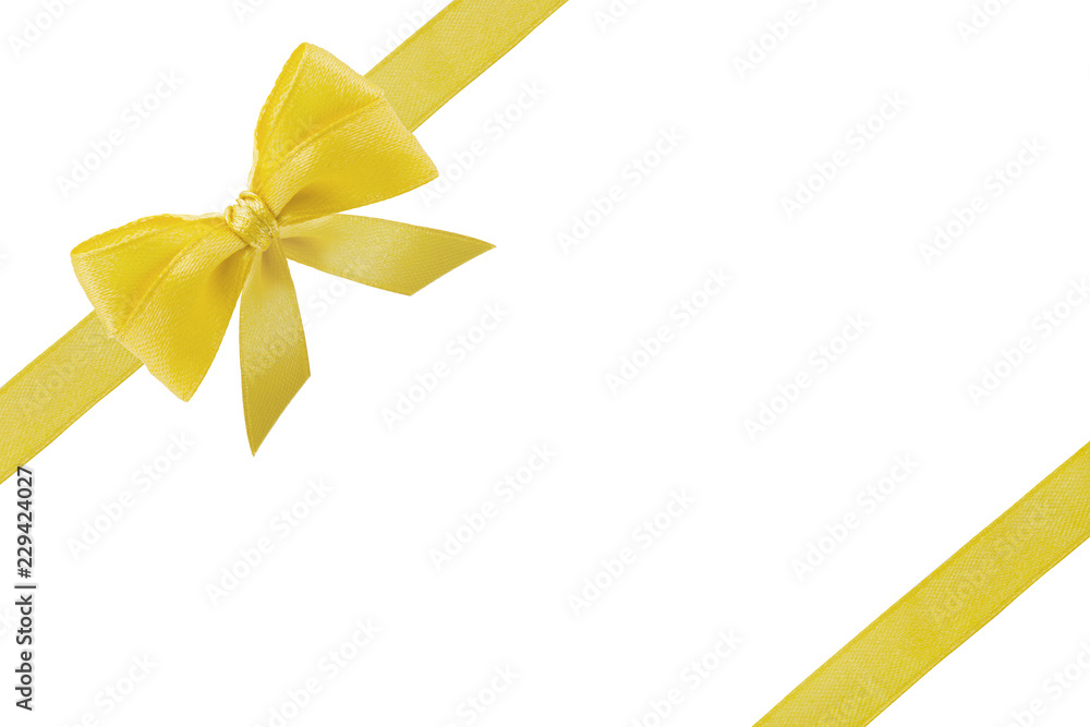 Golden or yellow bow ribbon with tails isolated on white background. Gift ribbon for Christmas box. Golden or yellow bow ribbon with tails isolated on white background. Gift ribbon for Christmas box.