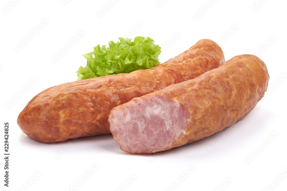 German specialty salami. Hard cured sausage with lettuce, Close-up, isolated on a white background. German specialty salami. Hard cured sausage with lettuce, Close-up, isolated on a white background.