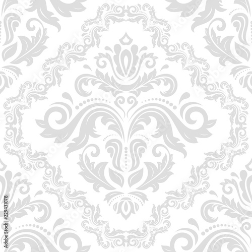 Classic seamless vector light silver pattern. Damask orient ornament. Classic vintage background. Orient ornament for fabric, wallpaper and packaging