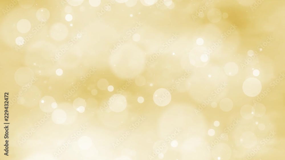 Gold colored blurry circle bokeh motion background. Gold colored blurry circle bokeh motion background.
