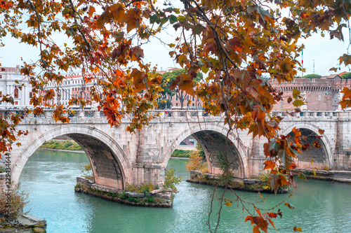 Roman stone arch bridge over the Tiber River. Bridge opposite the castle of the holy angel. Rome, Italy