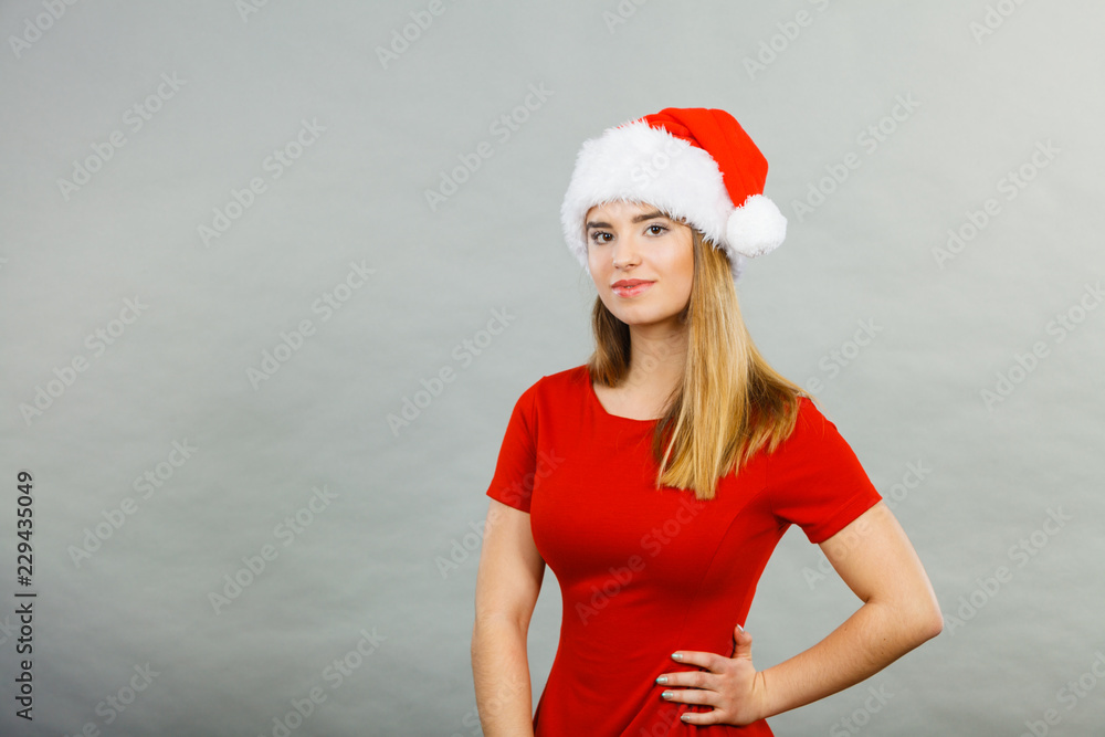 Woman wearing Santa Claus helper costume Woman wearing Santa Claus helper costume