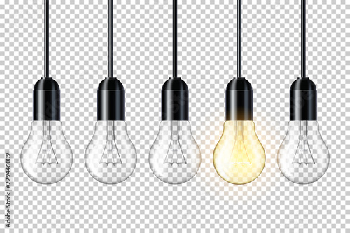 Transparent realistic light bulb, isolated. photo