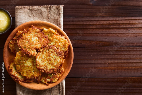 Canvas Print Fresh potato fritters or pancakes with apple sauce, traditional German snack or