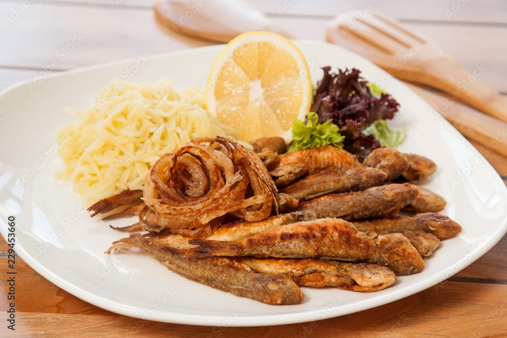 Fried fish with vegetables Fried fish with vegetables