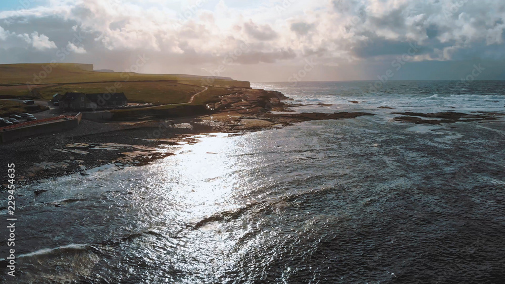 Aerial view over wild ocean water at the Irish west coast