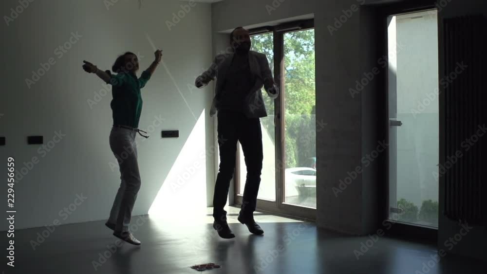Happy couple dancing at their new home, super slow motion 240fps Happy couple dancing at their new home, super slow motion 240fps