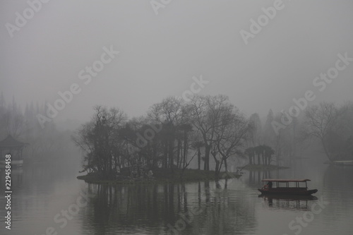 fog over the river with boat