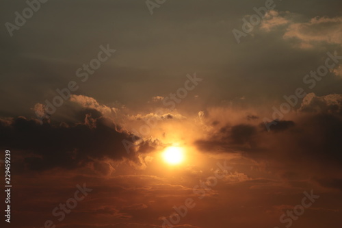 sky with clouds and sun