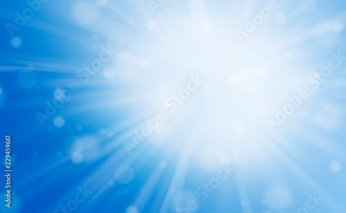 BRIGHT BLUE TONE OF NICE BOKEH AND SUNLIGHT BEAM FOR BACKGROUND