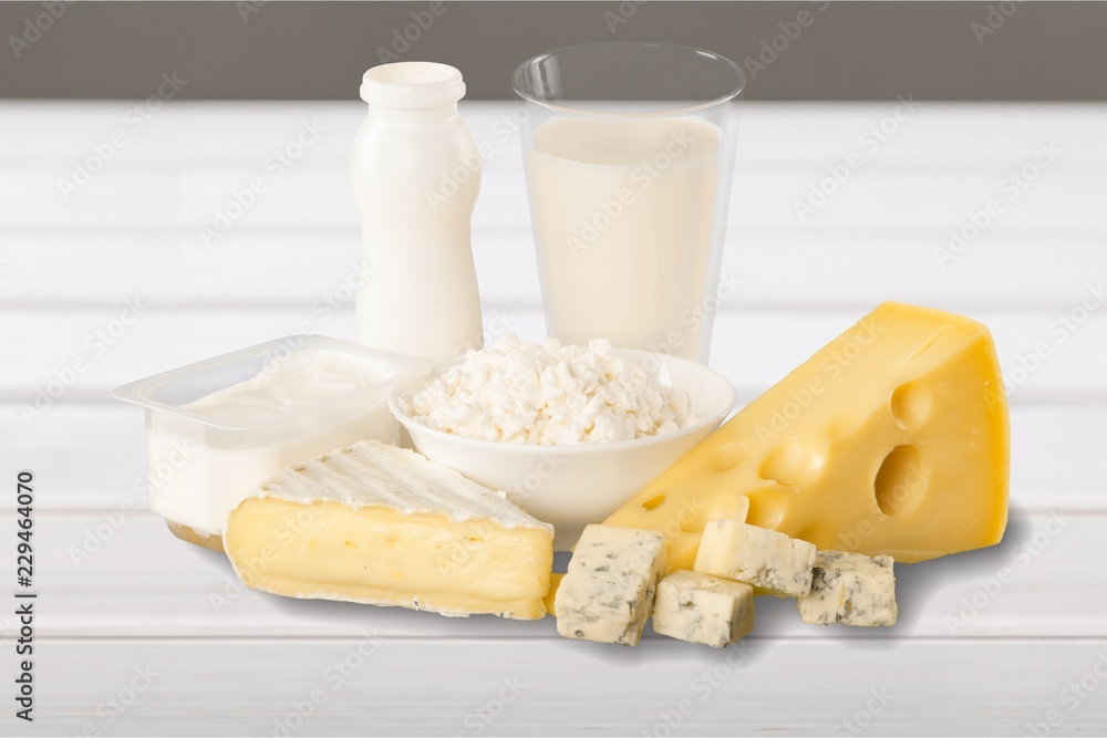 Fresh Dairy Products, Milk and Cheese isolated on white Fresh Dairy Products, Milk and Cheese isolated on white