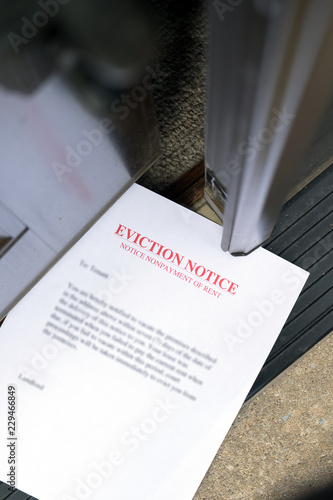 EVICTION NOTICE (ON THE FLOOR) SLIPPED UNDER OPENED ENTRANCE DOOR